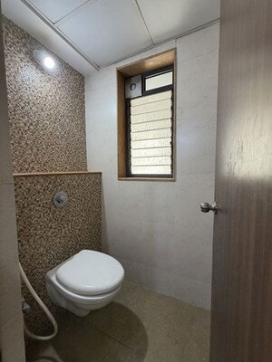 Bathroom in 1 BHK Apartment at Lodha Lakeshore Greens, Dombivli East – for Rent