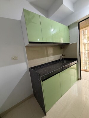 Kitchen in 1.5 BHK Apartment at Lodha Downtown, Dombivli East – for Rent