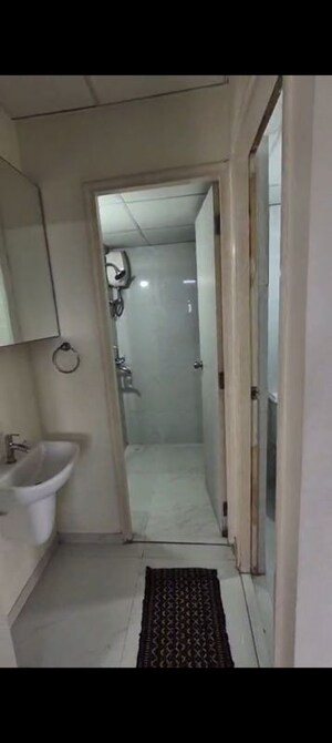Bathroom in 1 BHK Apartment at Runwal Gardens, Dombivli East – for Rent