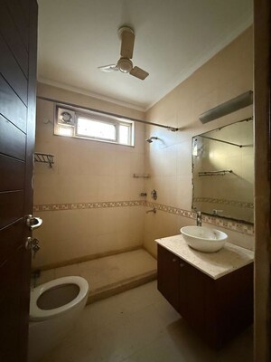 Bathroom in 3 BHK Builder Floor at New Friends Colony – for Rent