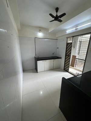 Kitchen in 2 BHK Apartment at Shiv Darshan Tower Malad West, Malad West – for Sale