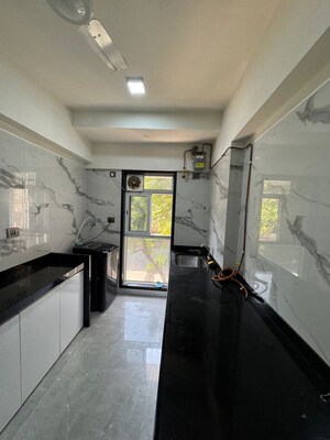 Kitchen in 3 BHK Apartment at Sanghvi Infenia, Santacruz East – for Rent