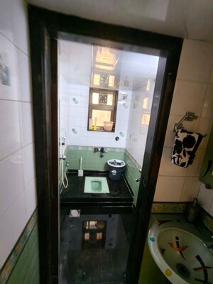 Bathroom in 2 BHK Apartment at Golden Square, Santacruz East – for Rent