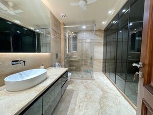 Bathroom in 3 BHK Apartment at Defence Colony – for Rent