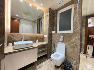 Bathroom in 3 BHK Apartment at Defence Colony – for Rent