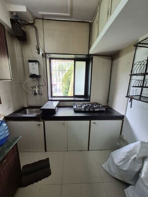 Kitchen in 1 BHK Apartment at Good Luck CHS, Goregaon West – for Rent