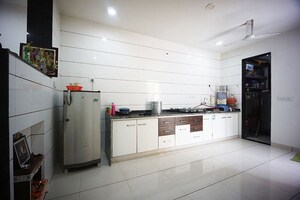 Kitchen in 4 BHK Independent House at Sola – for Sale