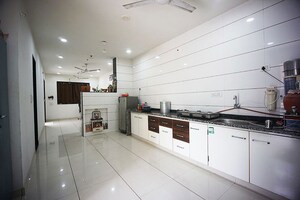 Kitchen in 4 BHK Independent House at Sola – for Sale