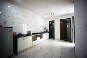Kitchen in 4 BHK Independent House at Sola – for Sale