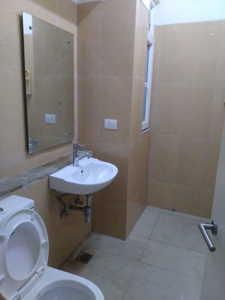 Bathroom, emaar-emerald-estate 3 Bedroom 1395 Sq.Ft. Apartment In Sector 65 Gurgaon 10685425