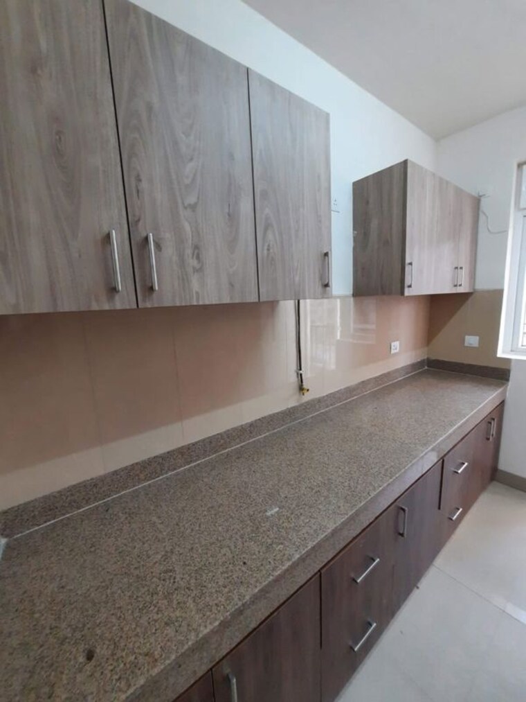 Kitchen, emaar-emerald-estate 3 Bedroom 1395 Sq.Ft. Apartment In Sector 65 Gurgaon 10685441