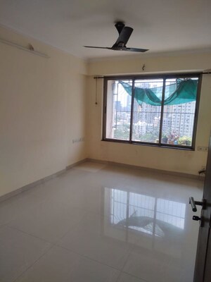 Room in 2 BHK Apartment at The Wadhwa Anmol Fortune, Goregaon West – for Rent