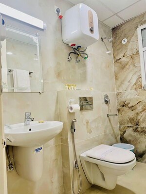 Bathroom in 3 BHK Apartment at Omaxe The Palace, Gomti Nagar – for Rent