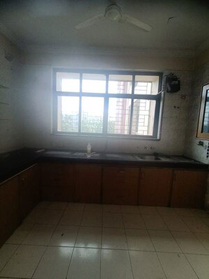 Kitchen in 2.5 BHK Apartment at Sharada Oxford Classic, Wanowrie – for Rent