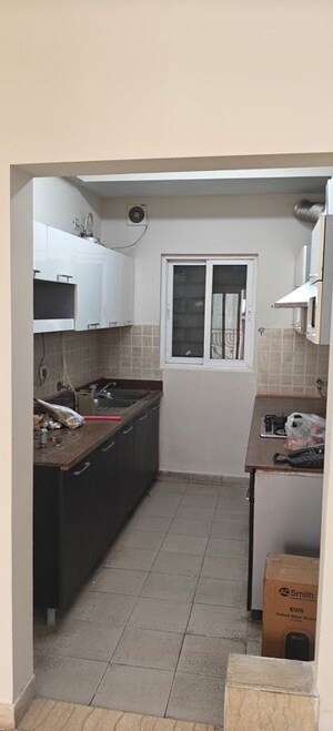 Kitchen in 2.5 BHK Apartment at Mahagun Moderne, Sector 78 – for Rent