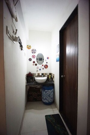 Living Room in 2 BHK Apartment at Ravinanda Trinity, Wagholi – for Sale