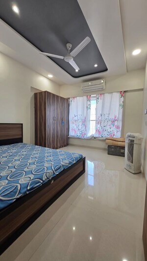 Bedroom in 2 BHK Apartment at Romell Umiya Grandeur, Goregaon East – for Rent