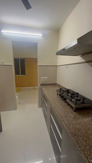 Kitchen in 2 BHK Apartment at Group Seven Rushi Heights, Goregaon East – for Rent