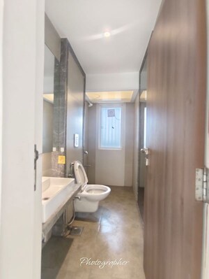 Bathroom in 2 BHK Apartment at Elegant Navratnamala CHS, Santacruz East – for Rent