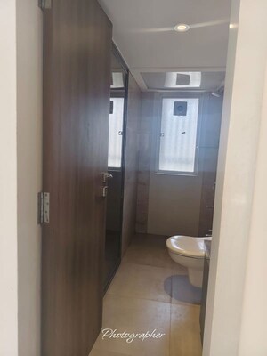Bathroom in 2 BHK Apartment at Elegant Navratnamala CHS, Santacruz East – for Rent