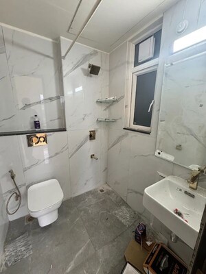 Bathroom in 3.5 BHK Apartment at Smart World Orchard, Sector 61 – for Rent
