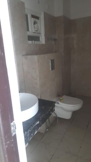 Bathroom in 2.5 BHK Apartment at Arjunganj – for Sale