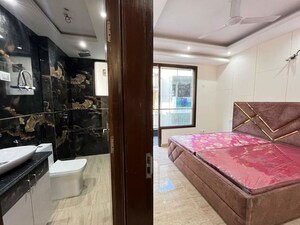 Bedroom in 3 BHK Builder Floor at Freedom Fighters Enclave – for Rent