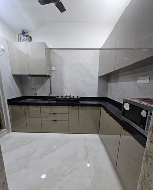 Kitchen in 2 BHK Apartment at Bhutra Mangal Karini Sky Breeze, Goregaon West – for Rent