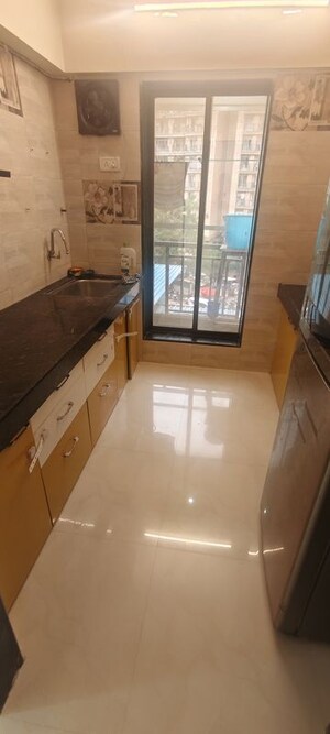 Kitchen in 1 BHK Apartment at RR Hill Galaxy, Mira Road – for Sale