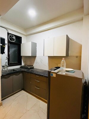 Kitchen in 2 BHK Builder Floor at Freedom Fighters Enclave – for Rent