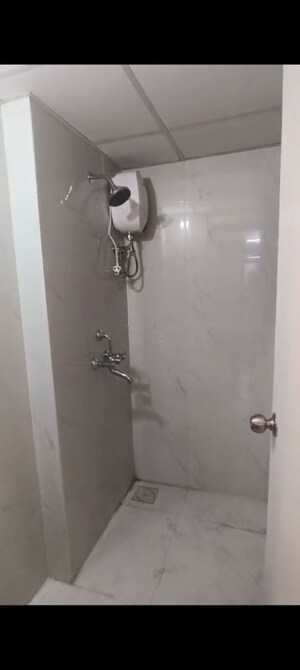 Bathroom in 1 BHK Apartment at Runwal Gardens, Dombivli East – for Rent