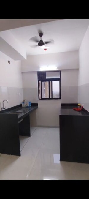 Kitchen in 1 BHK Apartment at Runwal Gardens, Dombivli East – for Rent