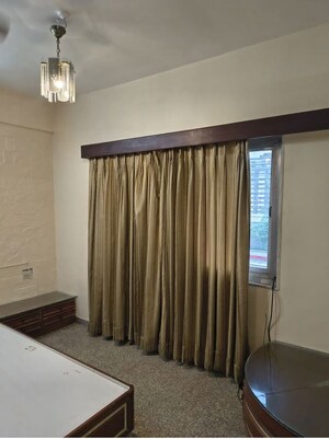 Room in 2 BHK Apartment at Khar West – for Rent