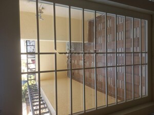 Staircase in 2 BHK Apartment at Puravankara Silversands, Mundhwa – for Rent