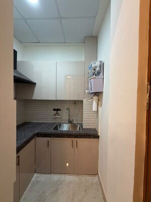 Kitchen in 1 RK Builder Floor at Golf Course Extension – for Rent