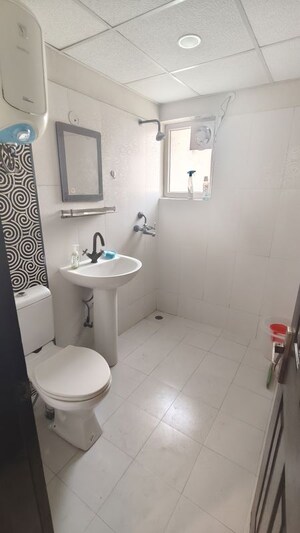 Bathroom in 2 BHK Apartment at Paramount Floraville, Sector 137 – for Rent
