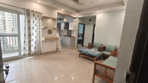 Living Room in 2 BHK Apartment at Paramount Floraville, Sector 137 – for Rent
