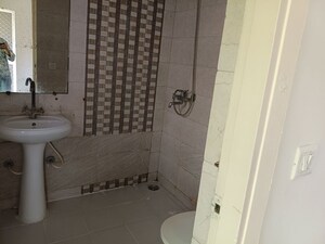 Bathroom in 2 BHK Apartment at Gaur City 2 - 12th Avenue, Sector 16c Greater Noida – for Rent