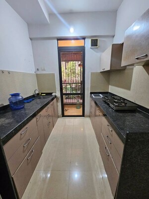 Kitchen in 2.5 BHK Apartment at Lodha Palava Downtown, Dombivli East – for Rent