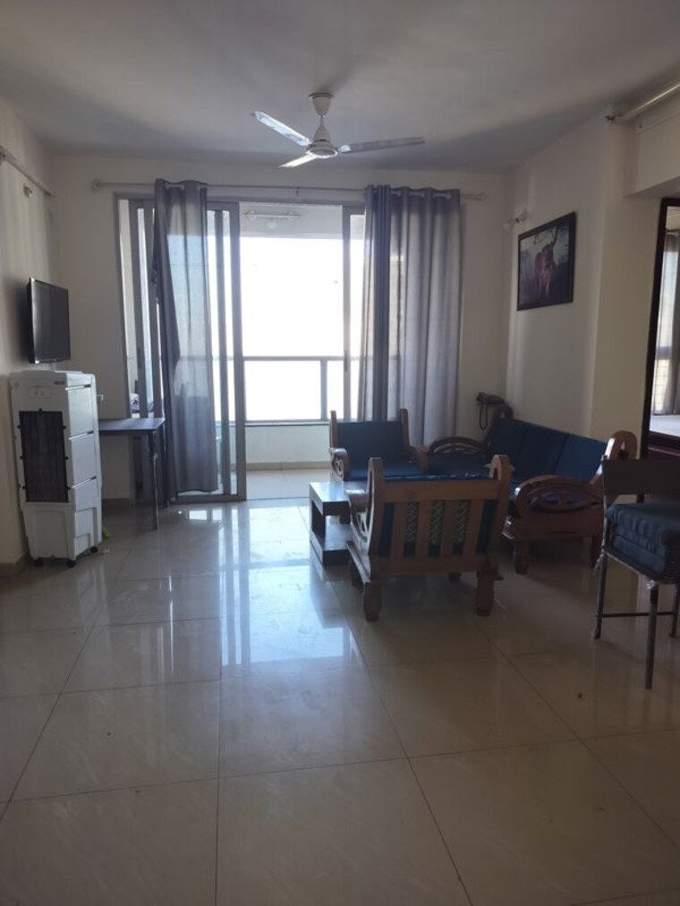 Living Room, amanora-future-towers 2.5 Bedroom 1250 Sq.Ft. Apartment In Hadapsar Pune 10685909