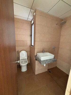 Bathroom in 3 BHK Apartment at Kalpataru Immensa G, Kolshet Road – for Rent
