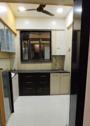 Kitchen in 2.5 BHK Apartment at Sai Vrindavan, Khadakpada – for Sale