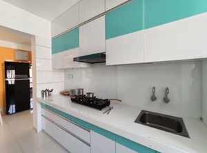Kitchen in 3 BHK Apartment at Swati Chrysantha, Shela – for Sale
