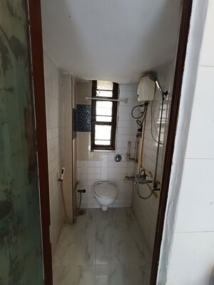 Bathroom in 1 BHK Apartment at Express Apartment, Yari Road – for Rent