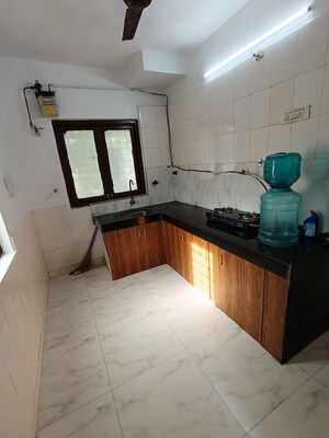 Kitchen in 1 BHK Apartment at Express Apartment, Yari Road – for Rent