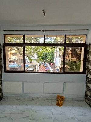 Parking in 1 BHK Apartment at Express Apartment, Yari Road – for Rent