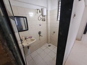 Bathroom in 1 BHK Apartment at Greenfield Rocks CHS, Jogeshwari East – for Rent