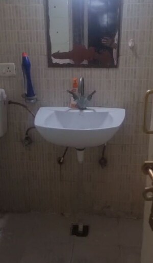 Bathroom in 3 BHK Apartment at UPAVP Ganga Yamuna And Hindon Enclave, Pratap Vihar – for Sale