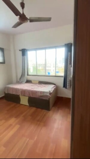 Bedroom in 2 BHK Apartment at New Gokul Plaza CHS, Kandivali East – for Rent