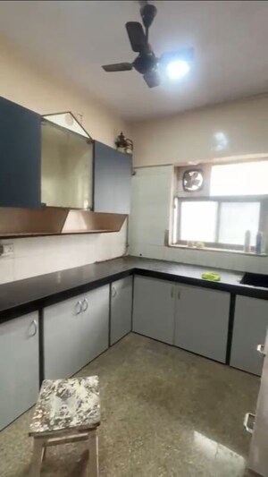 Kitchen in 2 BHK Apartment at New Gokul Plaza CHS, Kandivali East – for Rent